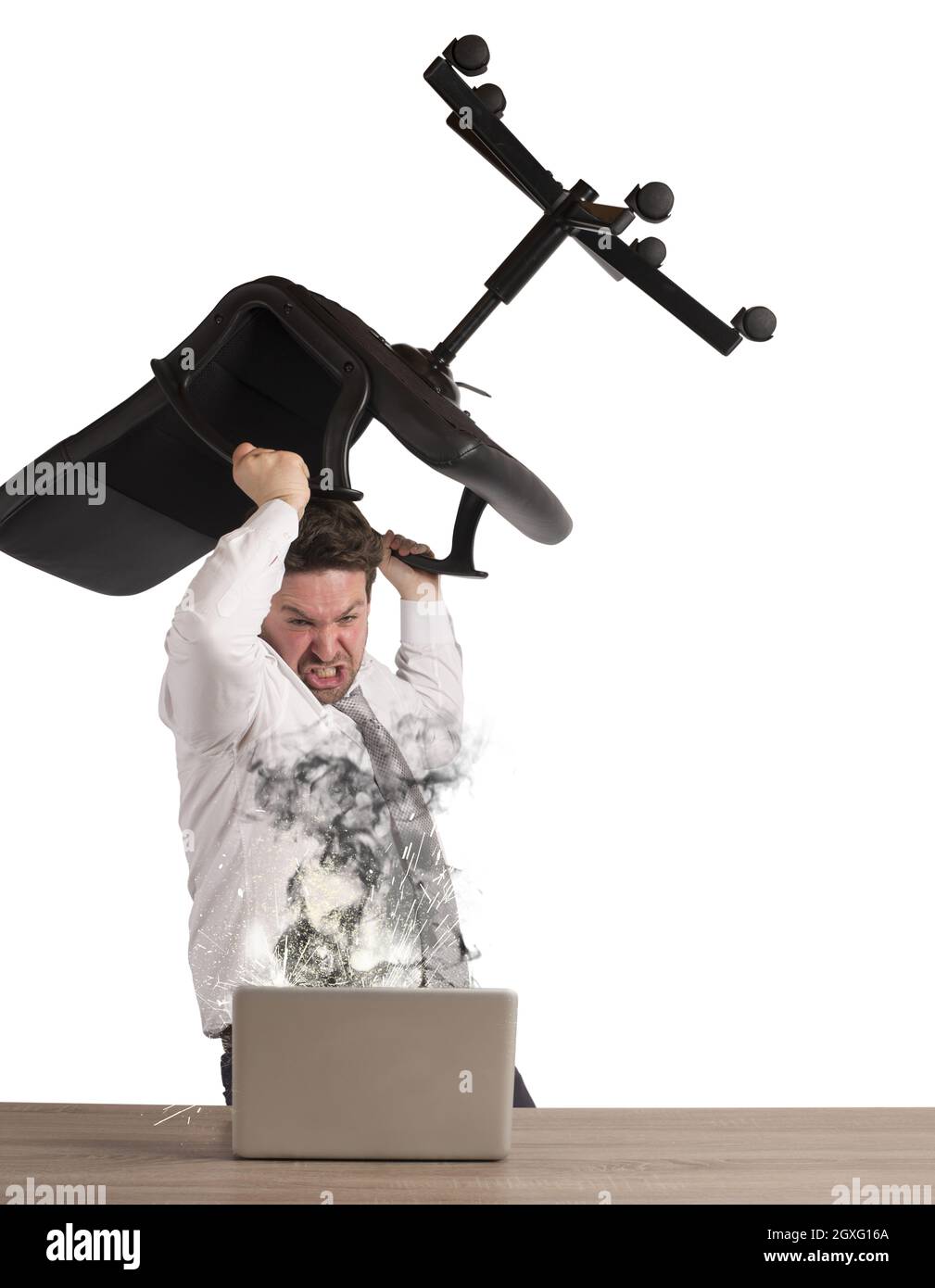 Stressed businessman breaks the computer with chair Stock Photo Alamy