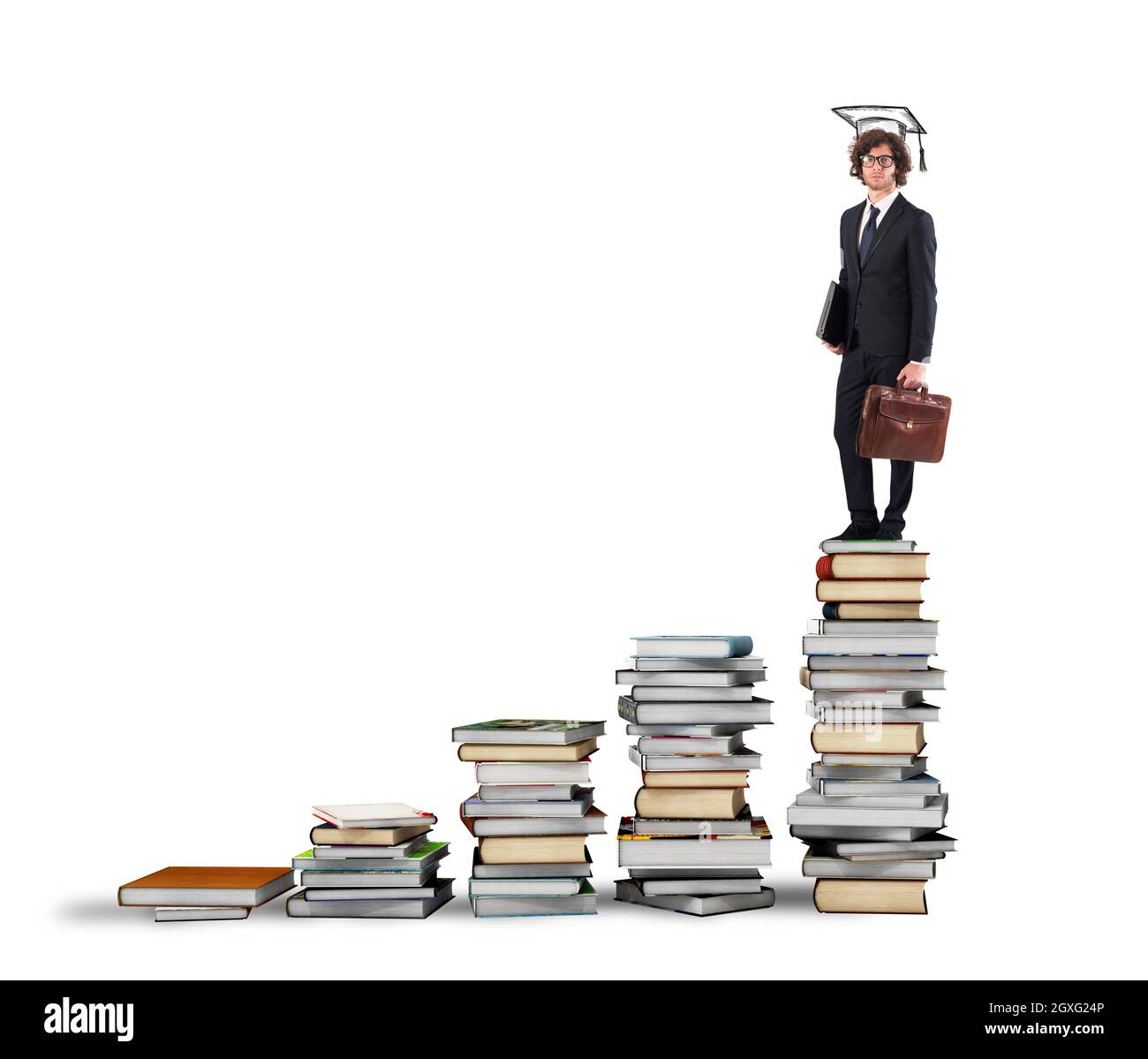 Scale with books and man with graduation hat Stock Photo - Alamy