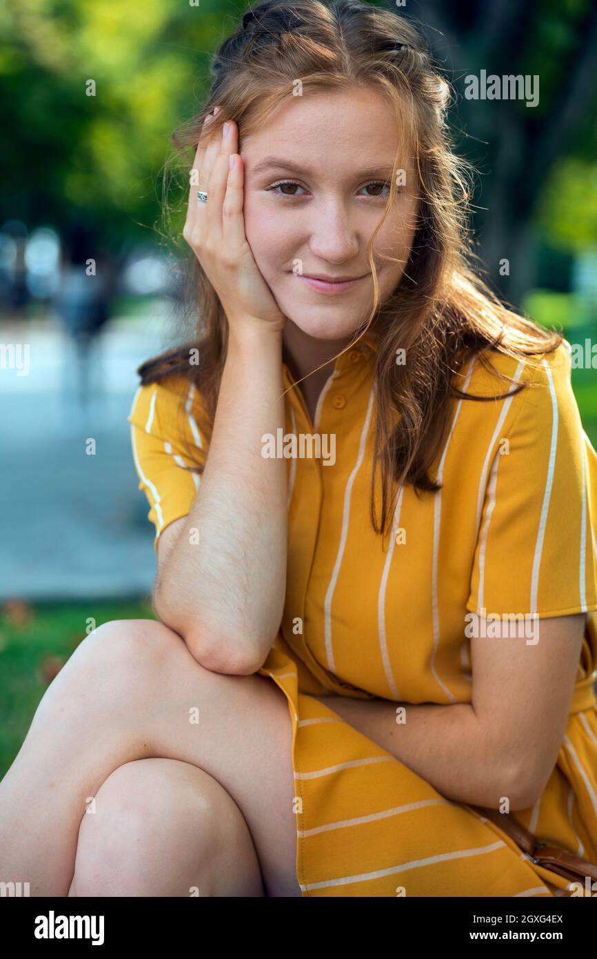 fun portrait of beautiful smiling girl at the park Stock Photo - Alamy