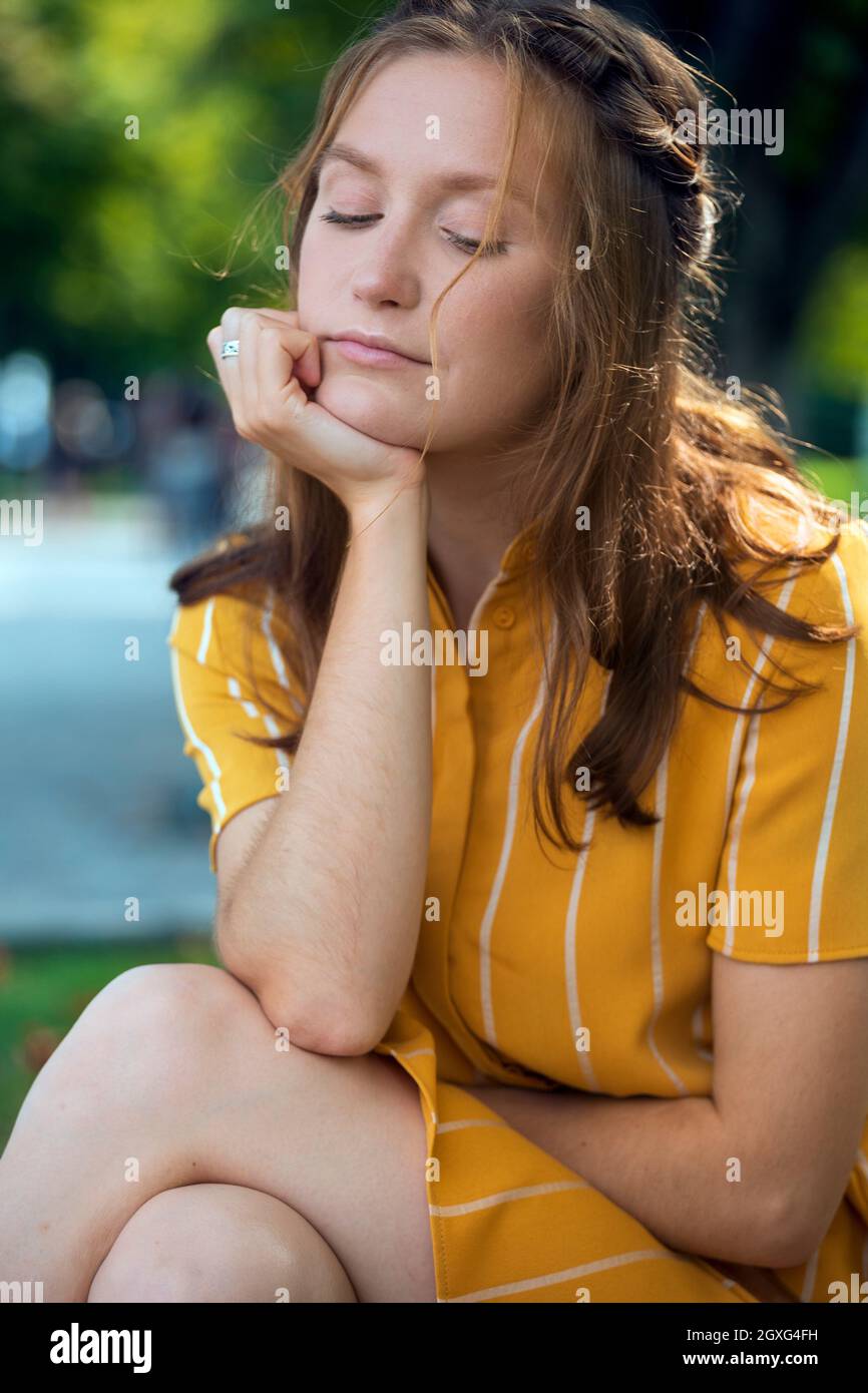 fun portrait of beautiful smiling girl at the park Stock Photo - Alamy