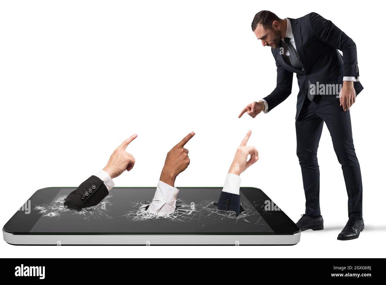Angry man victim of cyber bullying with people that indicate him inside a mobile phone Stock Photo