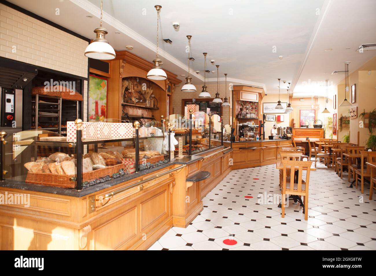 Cozy bakery cafe with delicious pastry on sale on the display, copy