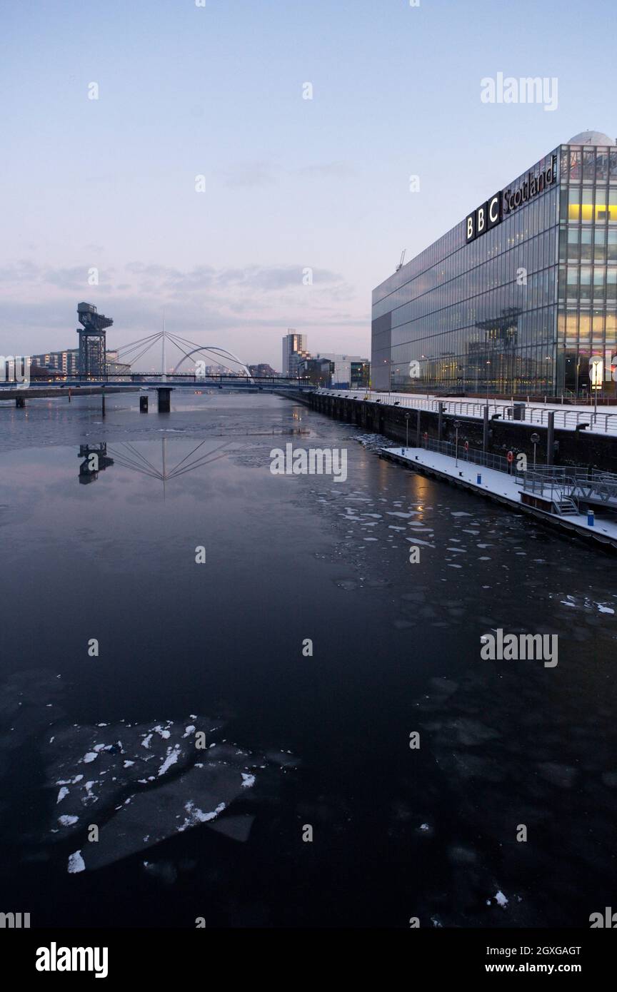 View east along the River Clyde during the deep freeze of January 2010 showing the river frozen at dusk. Stock Photo