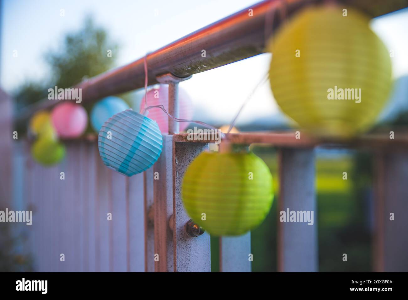 Colorful lampions outside, evening, garden party Stock Photo Alamy