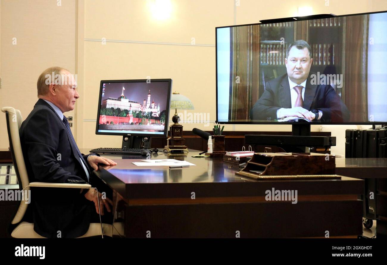 Novo-Ogaryovo, Russia. 04th Oct, 2021. Russian President Vladimir Putin holds a video meeting with the Acting Governor of the Tambov Region, Maxim Yegorov, from the Novo-Ogaryov state residence October 4, 2021 near Moscow, Russia. Credit: Evgeniy Paulin/Kremlin Pool/Alamy Live News Stock Photo