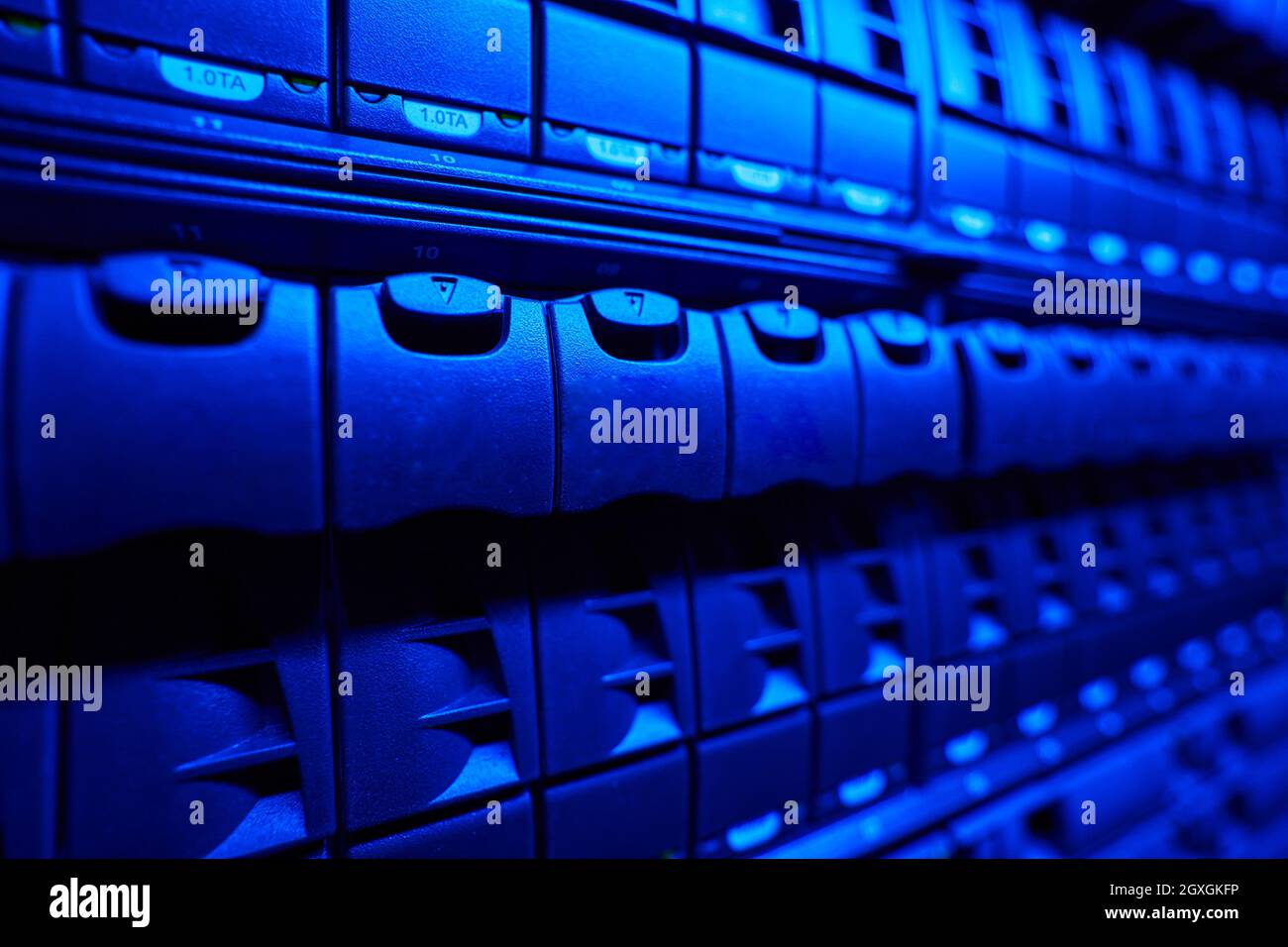 Close up side view image of working data center full of rack servers ...