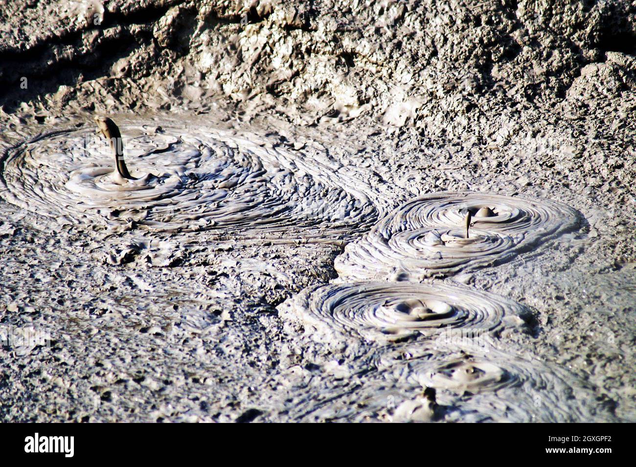 An active bubbling mud pool with mud pots in the Taupo Volcanic Zone