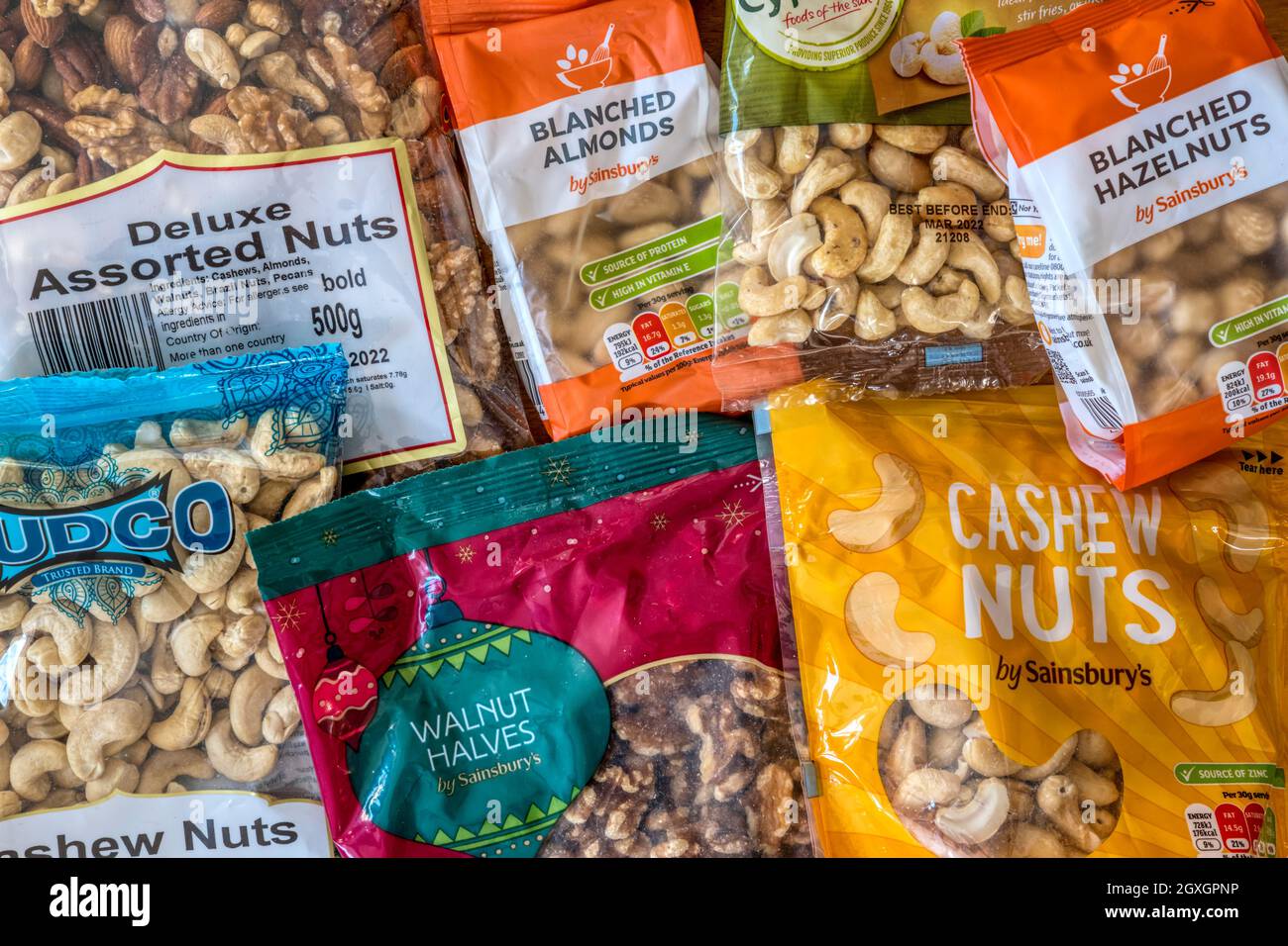 A selection of packaged shelled nuts. Stock Photo