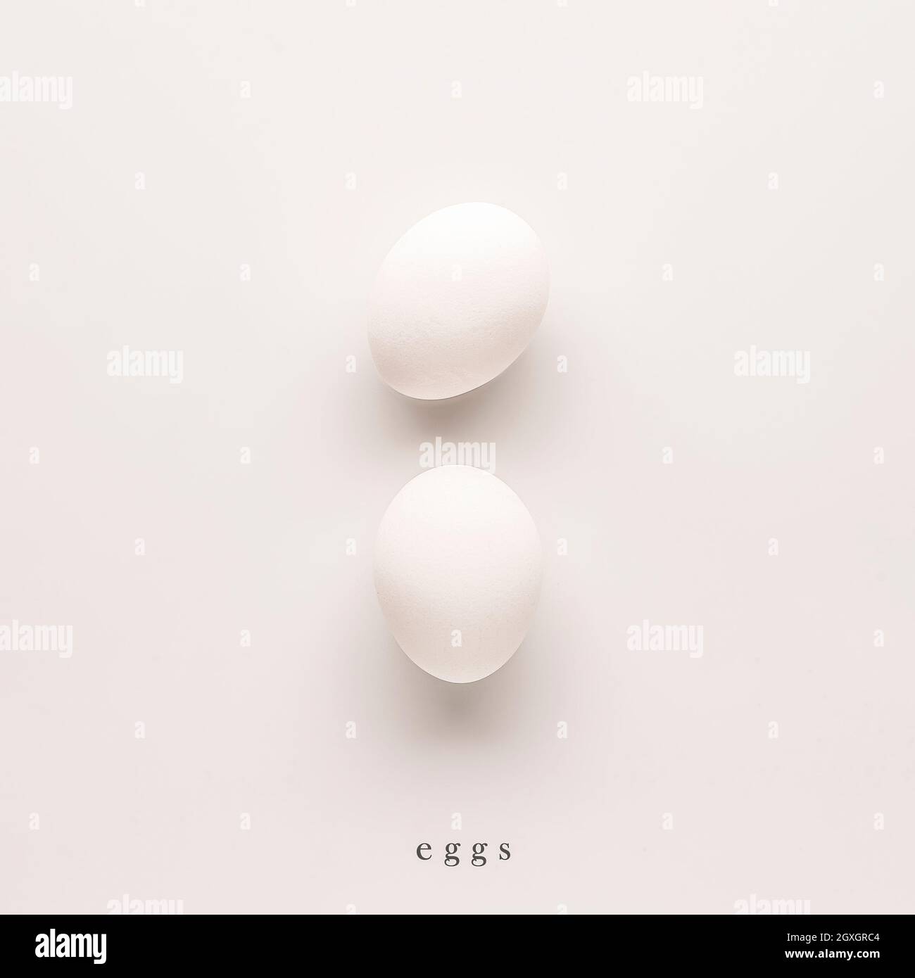 two eggs in a shell on a white background. graphic photo for interior ...