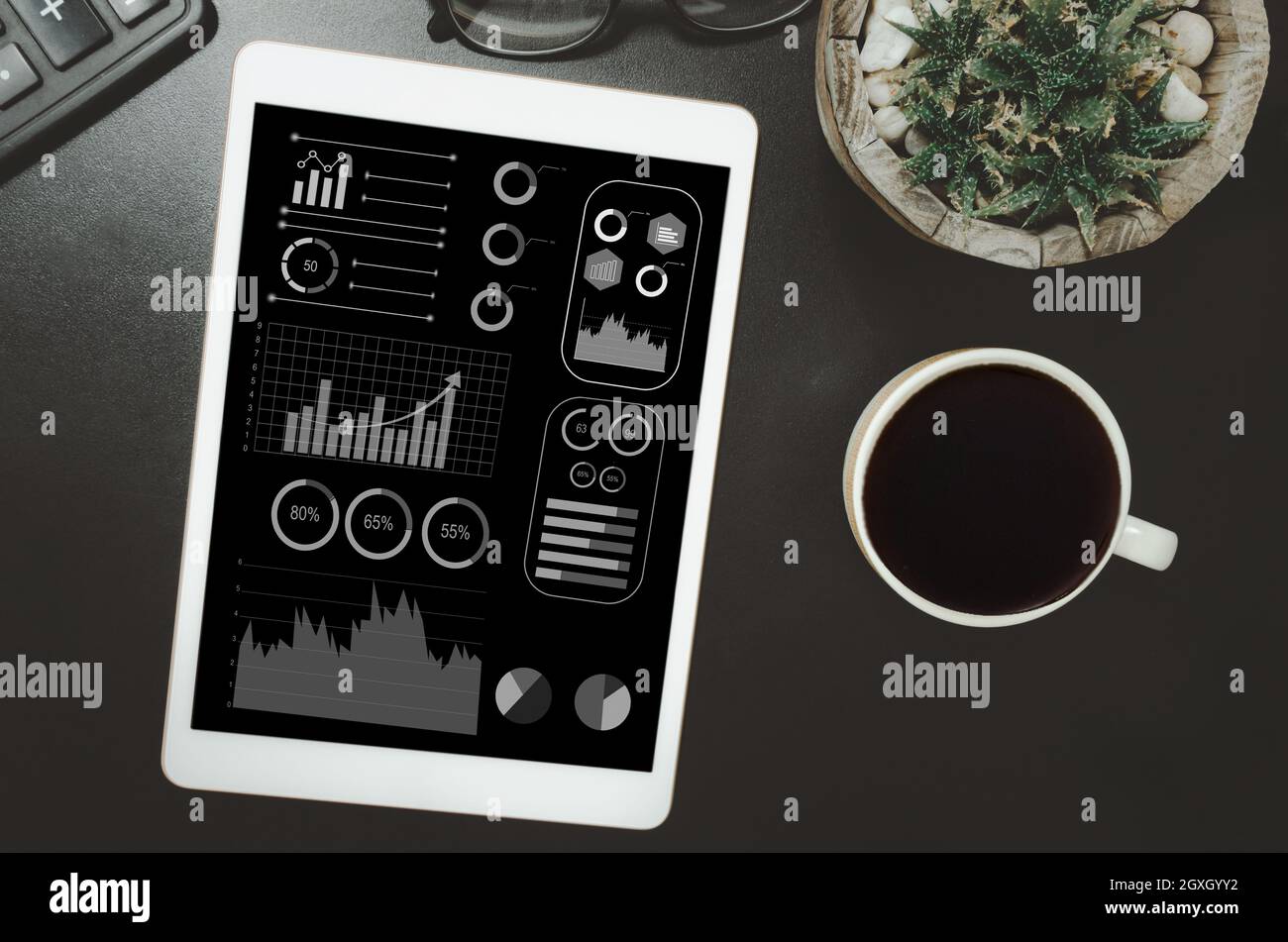 Business graphs and tablet charts analyze financial statements. Marketing and profit and loss in business plan. top view Stock Photo