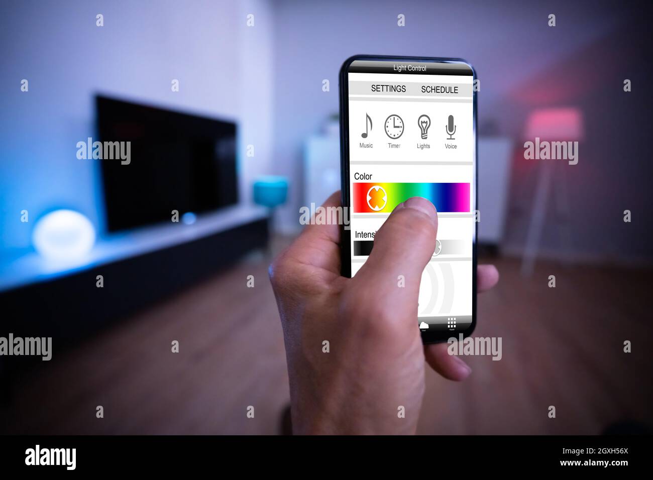 Smart Light Control Using Mobile Phone And Smarthome Stock Photo
