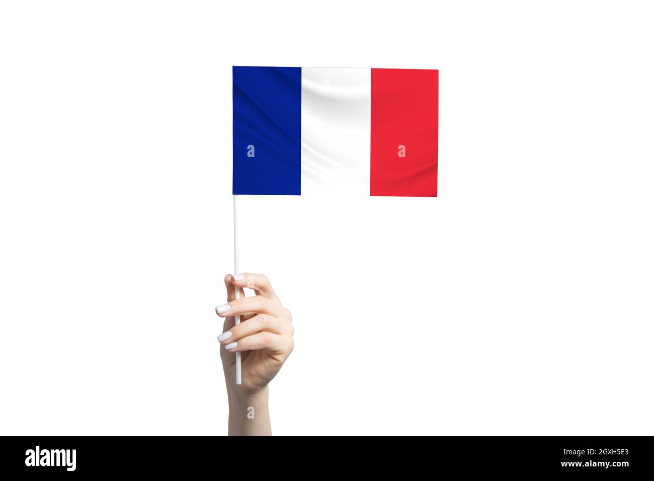 Beautiful female hand holding France flag, isolated on white background