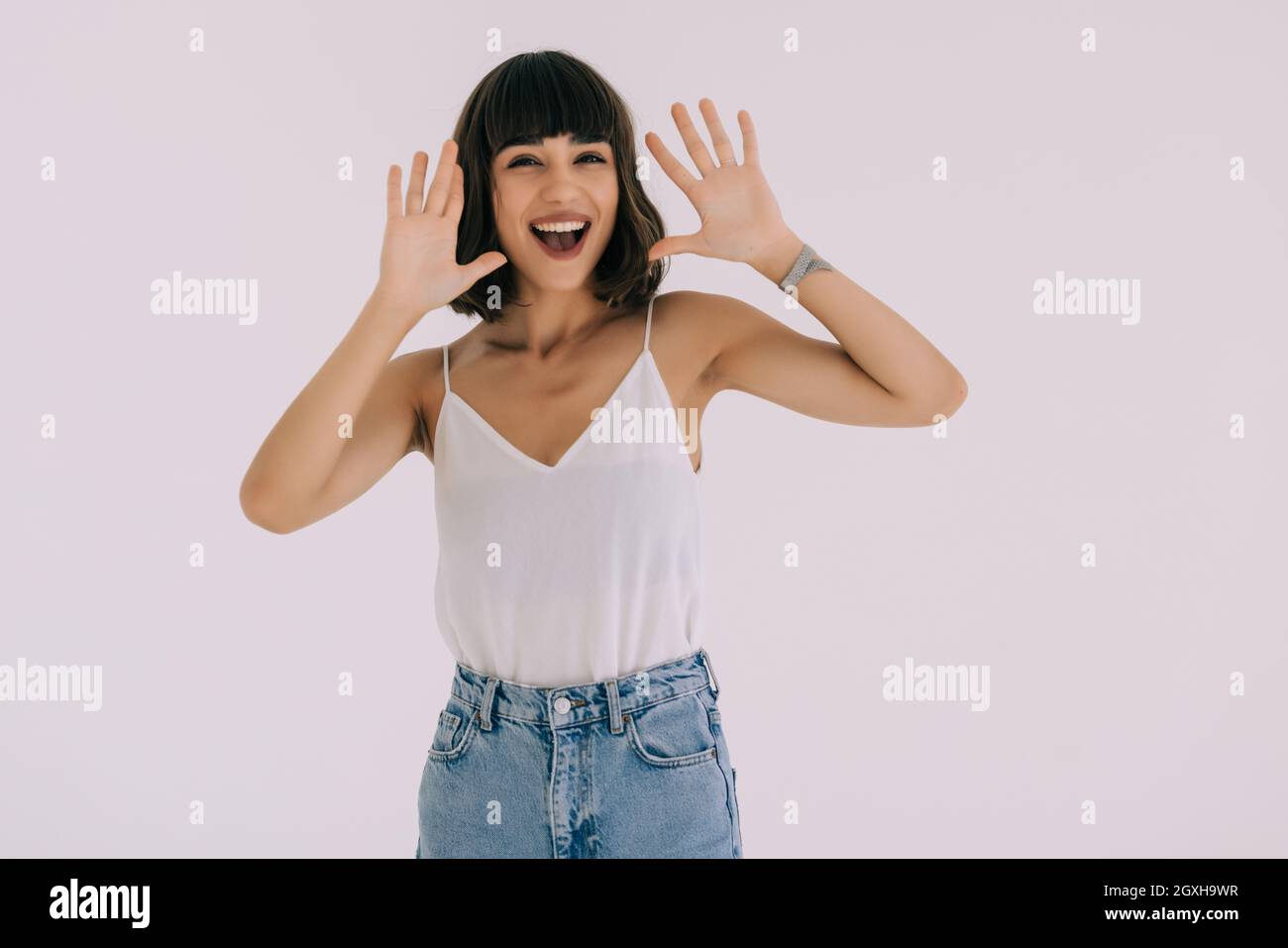 Young surprised woman isolated on white background Stock Photo - Alamy