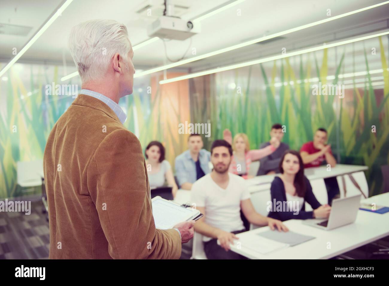 group of students study with professor in modern school classroom Stock ...