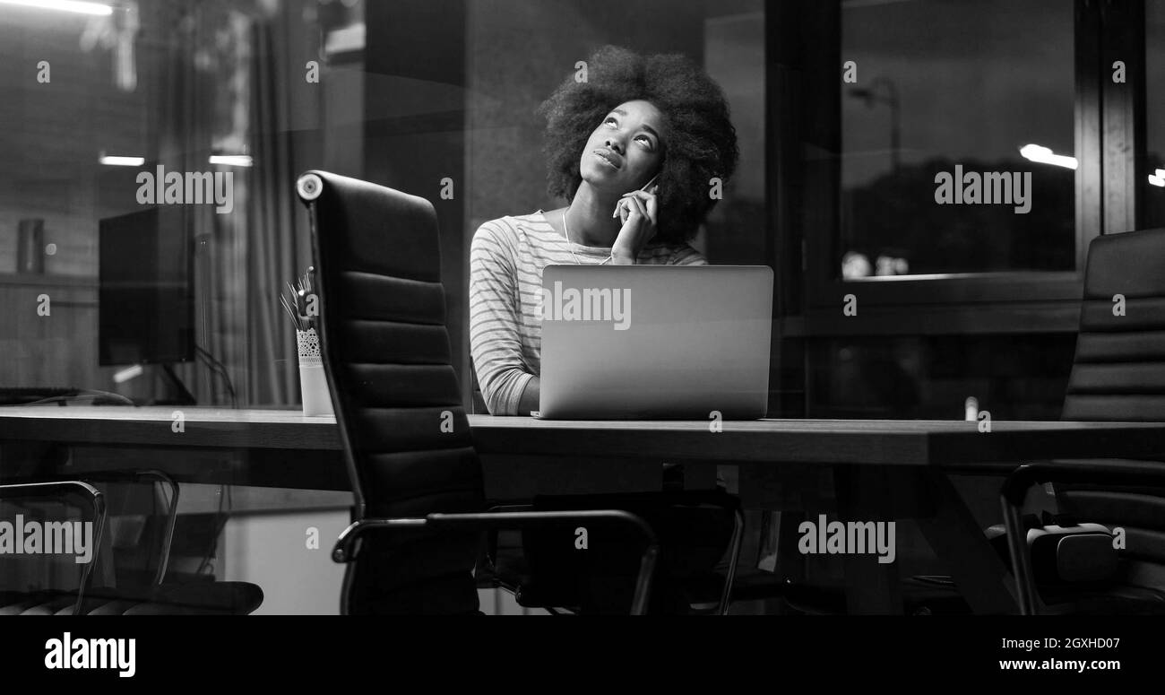 Young happy african businesswoman working Black and White Stock Photos ...