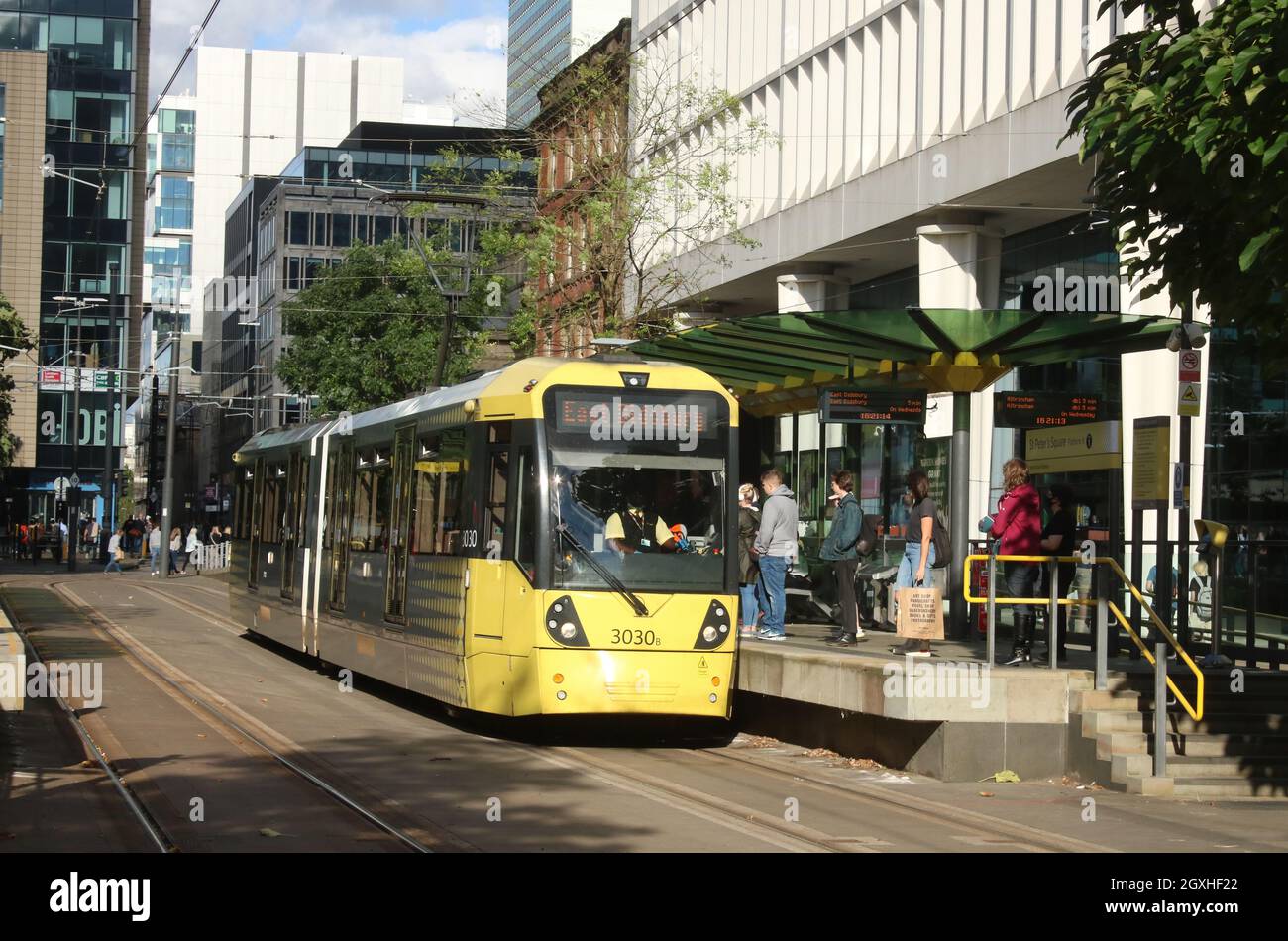 Manchester Metrolink Bombardier M5000 tram, number 3030, at the tram stop in St Peter's Square with a service to East Didsbury on 22nd September 2021. Stock Photo