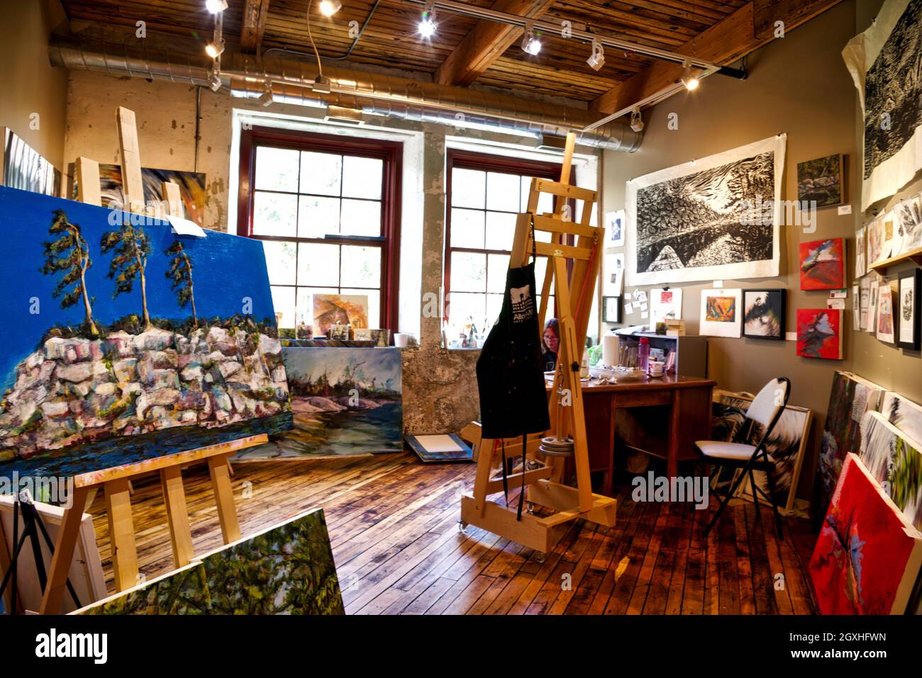 Art studio with paintings on the easel Stock Photo