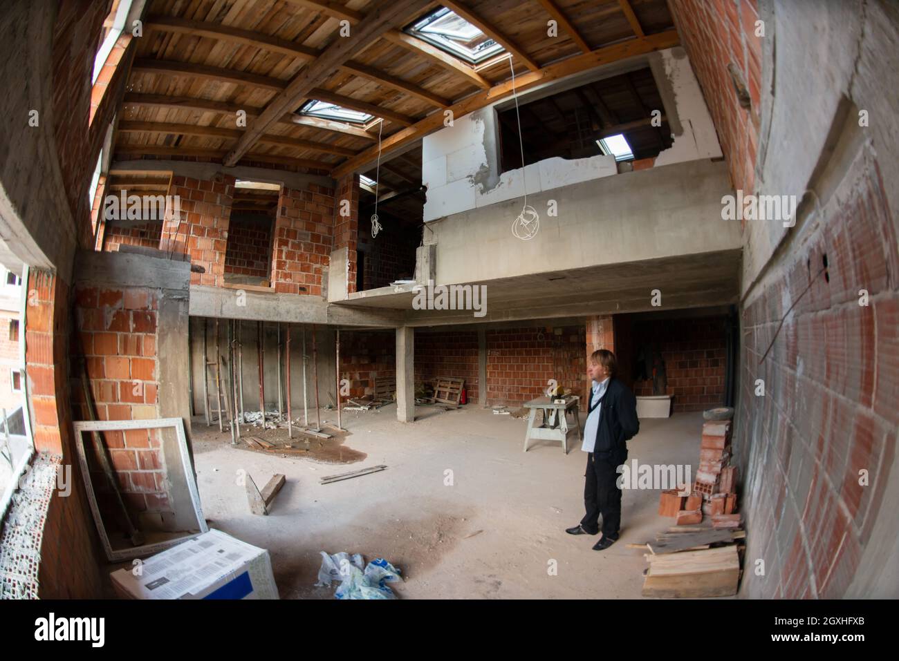 View of construction site interior of new two levels apartment with windows and ...