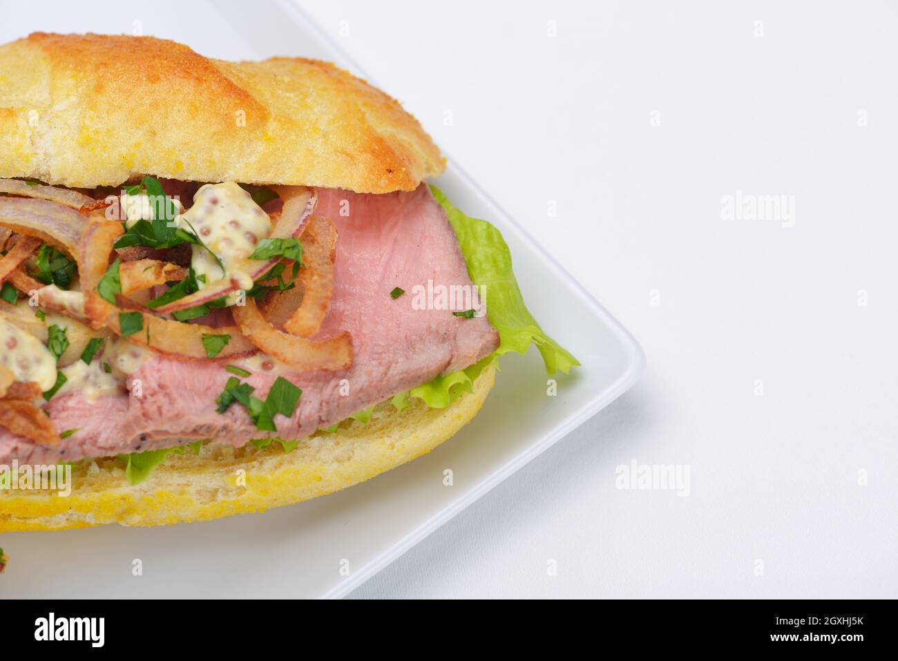 fresh sandwich close up with vegetables and meat fish isolated on white ...