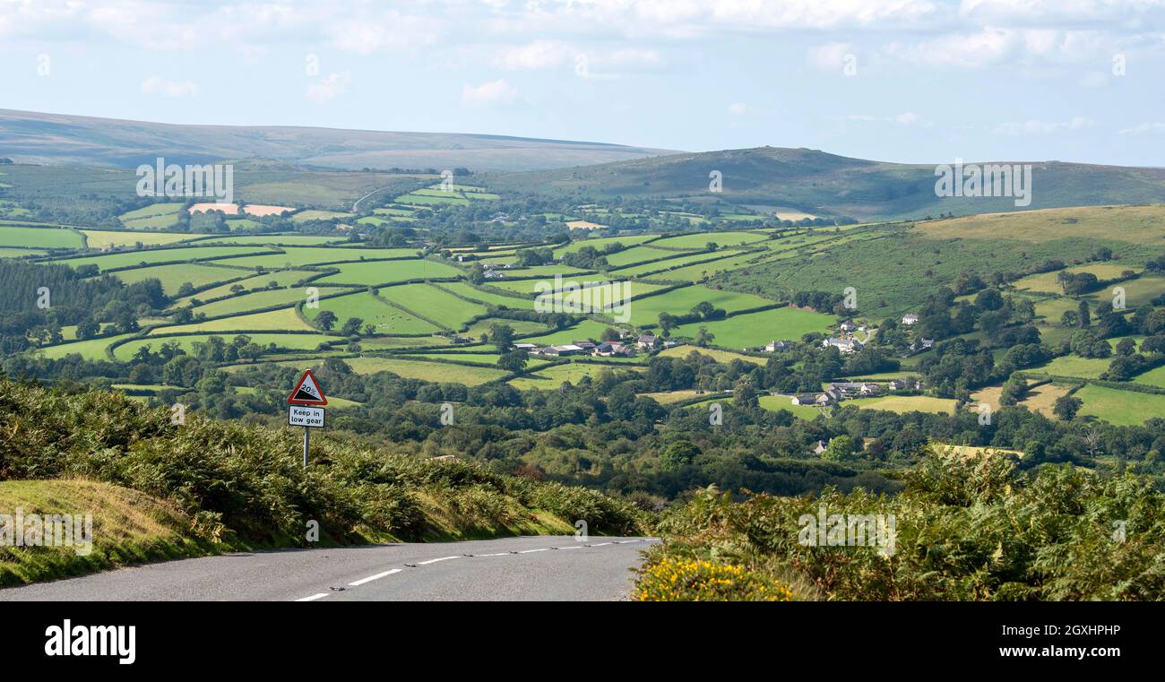 Dartmoor, Devon, England, UK. 2021,  A high view over Dartmoor near Widecombe on the Moor with backdrop of green fields and beautiful countryside. Stock Photo