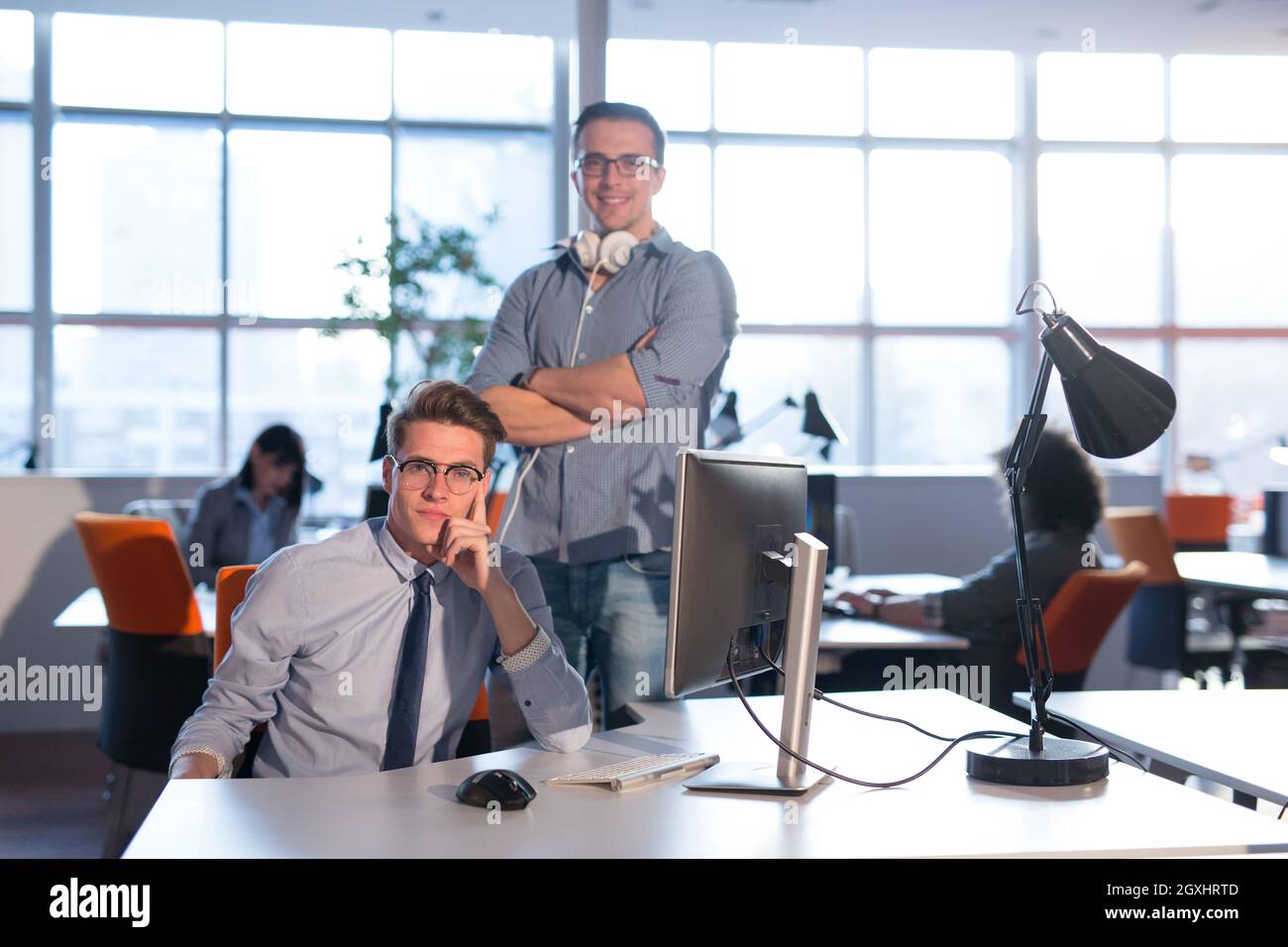 Computer Preparing two business people using computer preparing for next meeting and ...