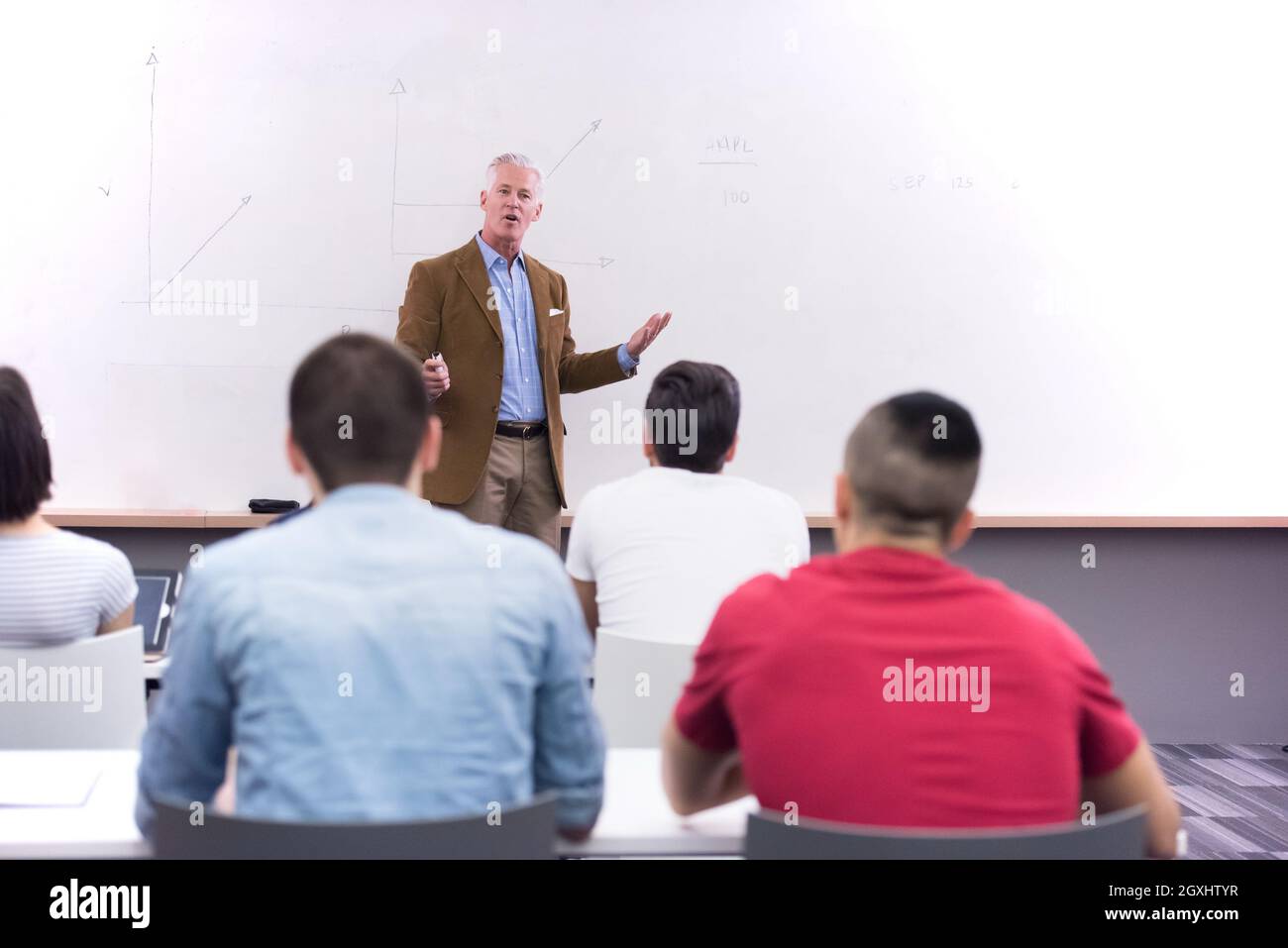 group of students study with professor in modern school classroom Stock ...