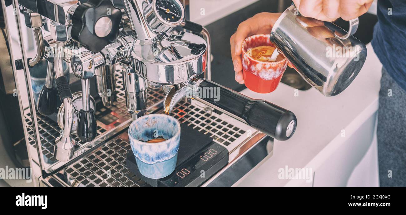 Coffee machine barista man making espresso macchiato pouring steamed