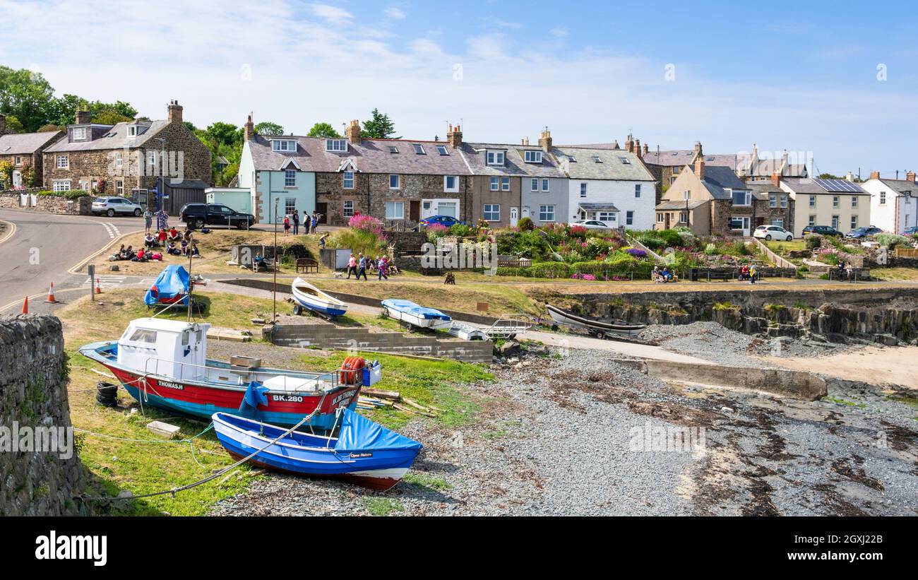 Fishing boats in the harbour in the coastal village of Craster Village Northumberland coast Northumbria Northumberland England GB UK Europe Stock Photo