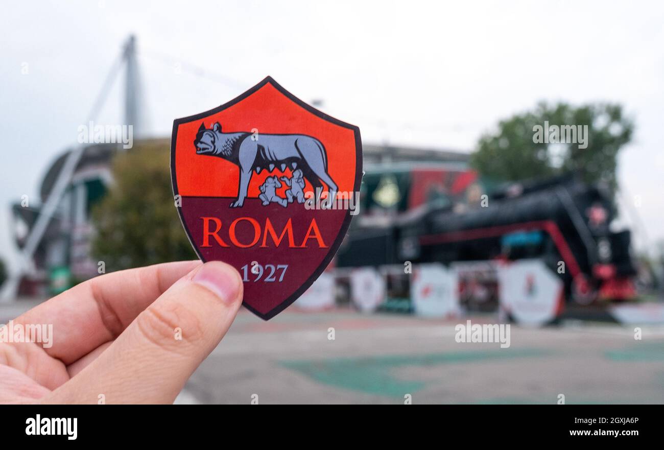 August 30, 2021, Rome, Italy. A.S. Football Club emblem Roma against the  backdrop of a modern stadium Stock Photo - Alamy