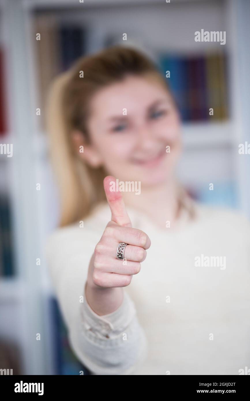 portrait of happy smilling female student girl in school library Stock ...