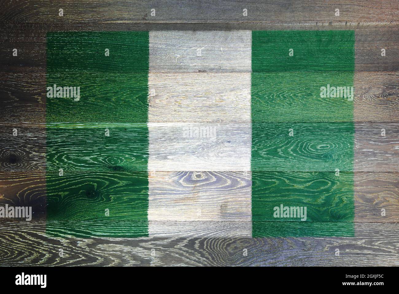 A Nigeria flag on rustic old wood surface background Stock Photo - Alamy