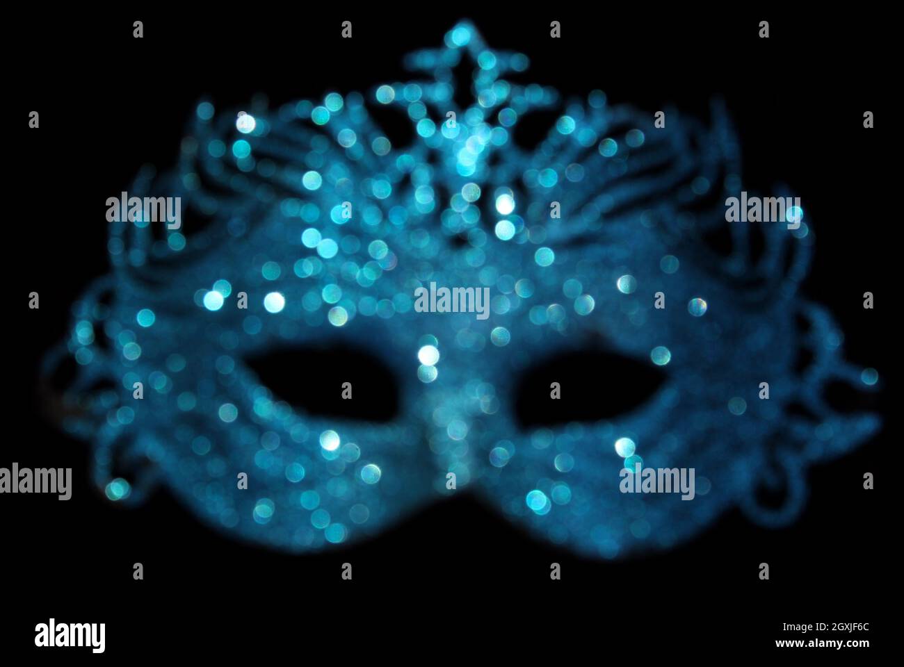 Blurred Blue Carnival Mask Bokeh Stock Photo - Alamy