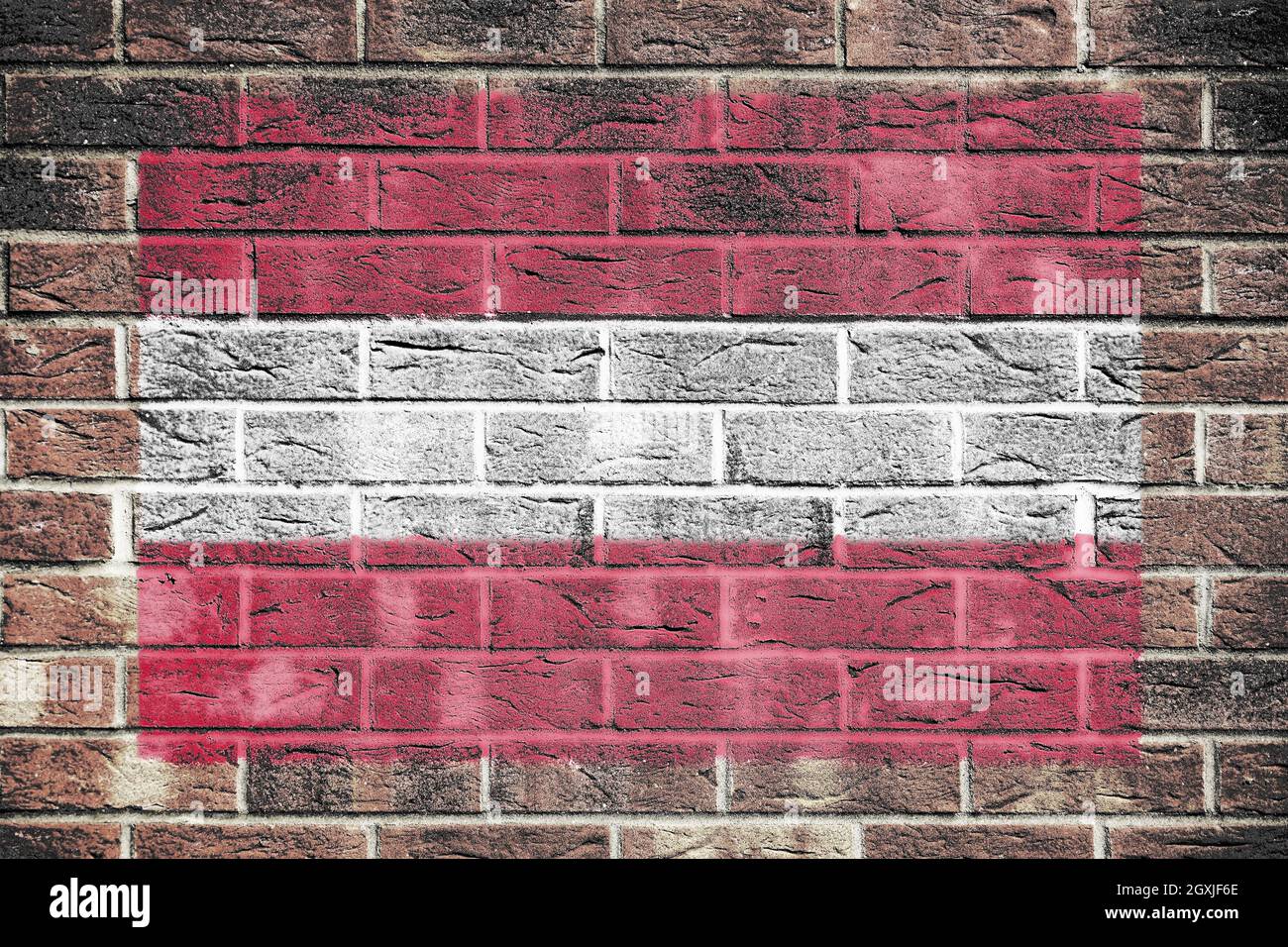 An Austria flag on a brick wall background Stock Photo - Alamy