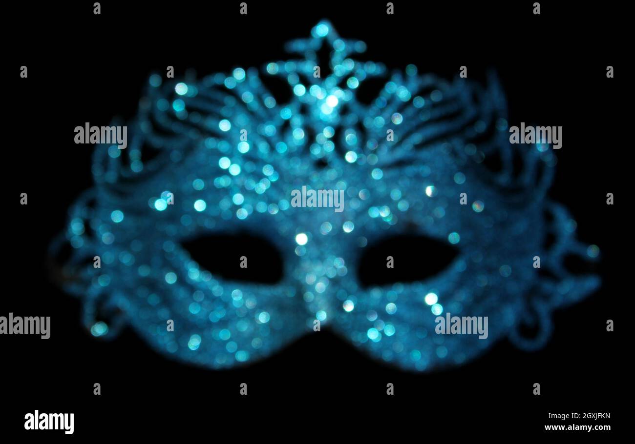 Blurred Blue Carnival Mask Bokeh Stock Photo - Alamy