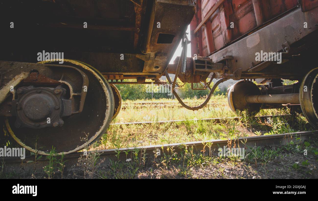 Two old train cars connected with rusty coupler on railway Stock Photo Alamy