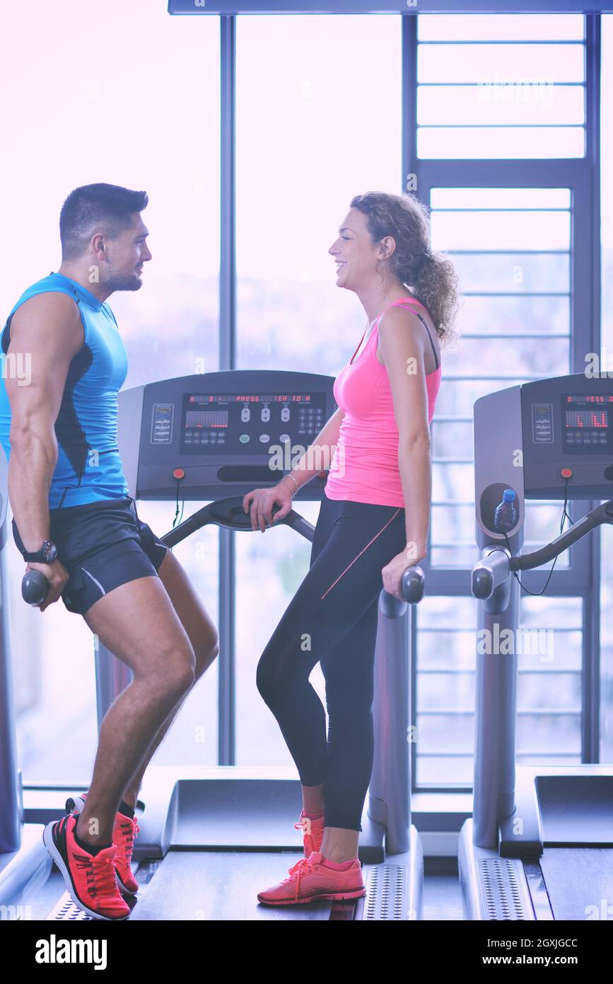 attractive couple at the gym looking happy Stock Photo - Alamy