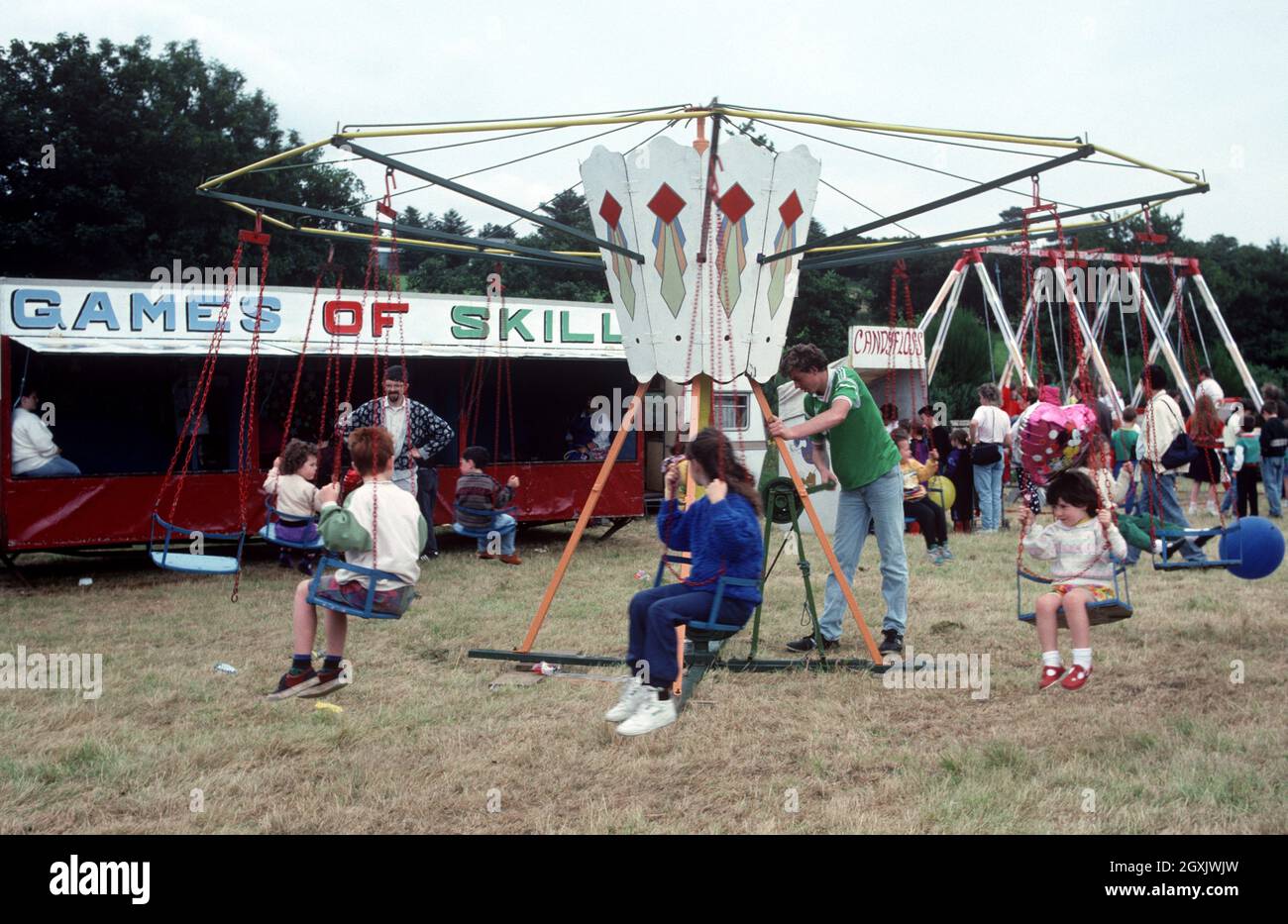 Roundabout swings, fun fair Ardara Show, Donegal, Ireland, 1990s Stock