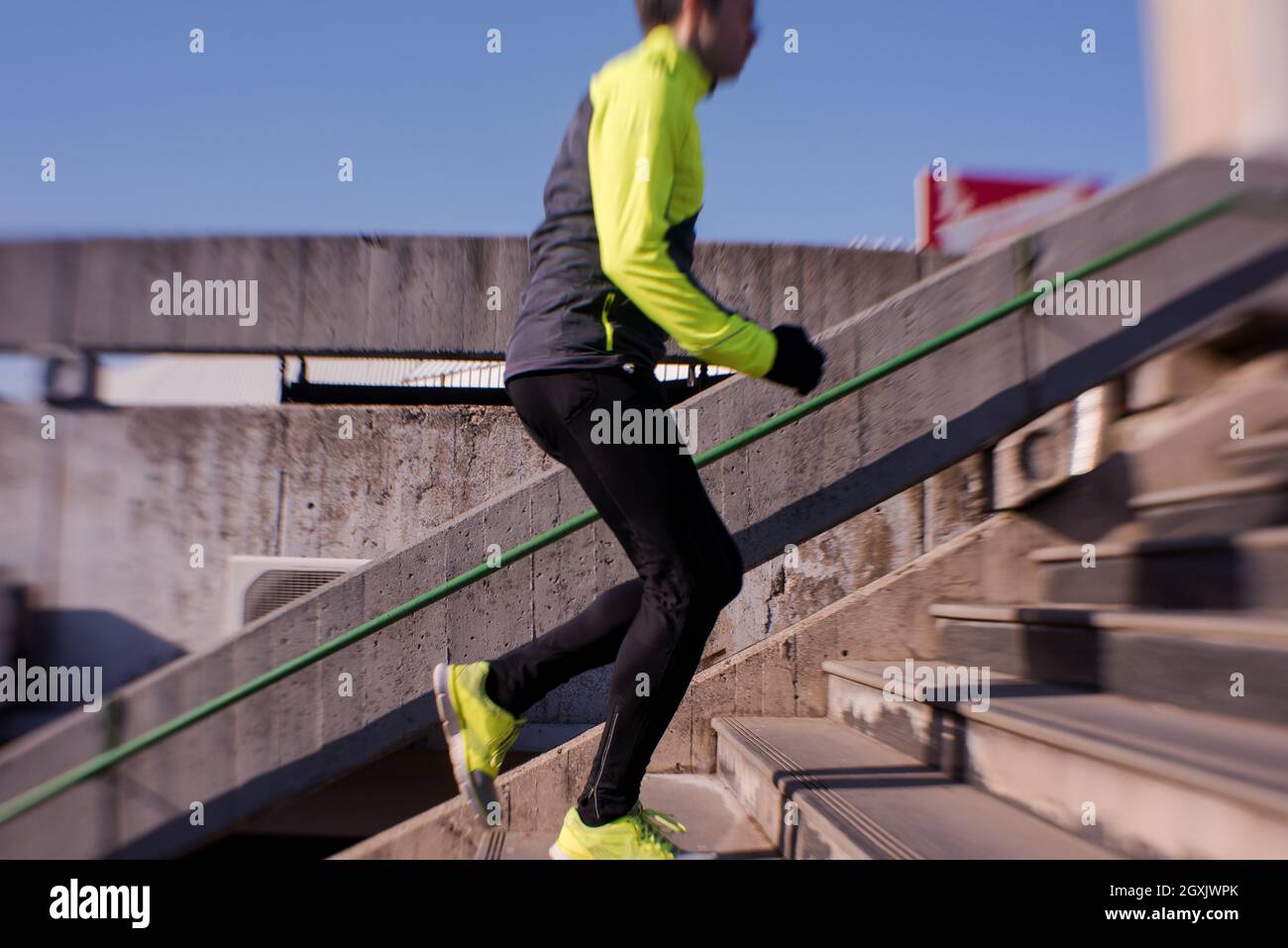 man jogging at cold autumn mornigng on steps Stock Photo Alamy