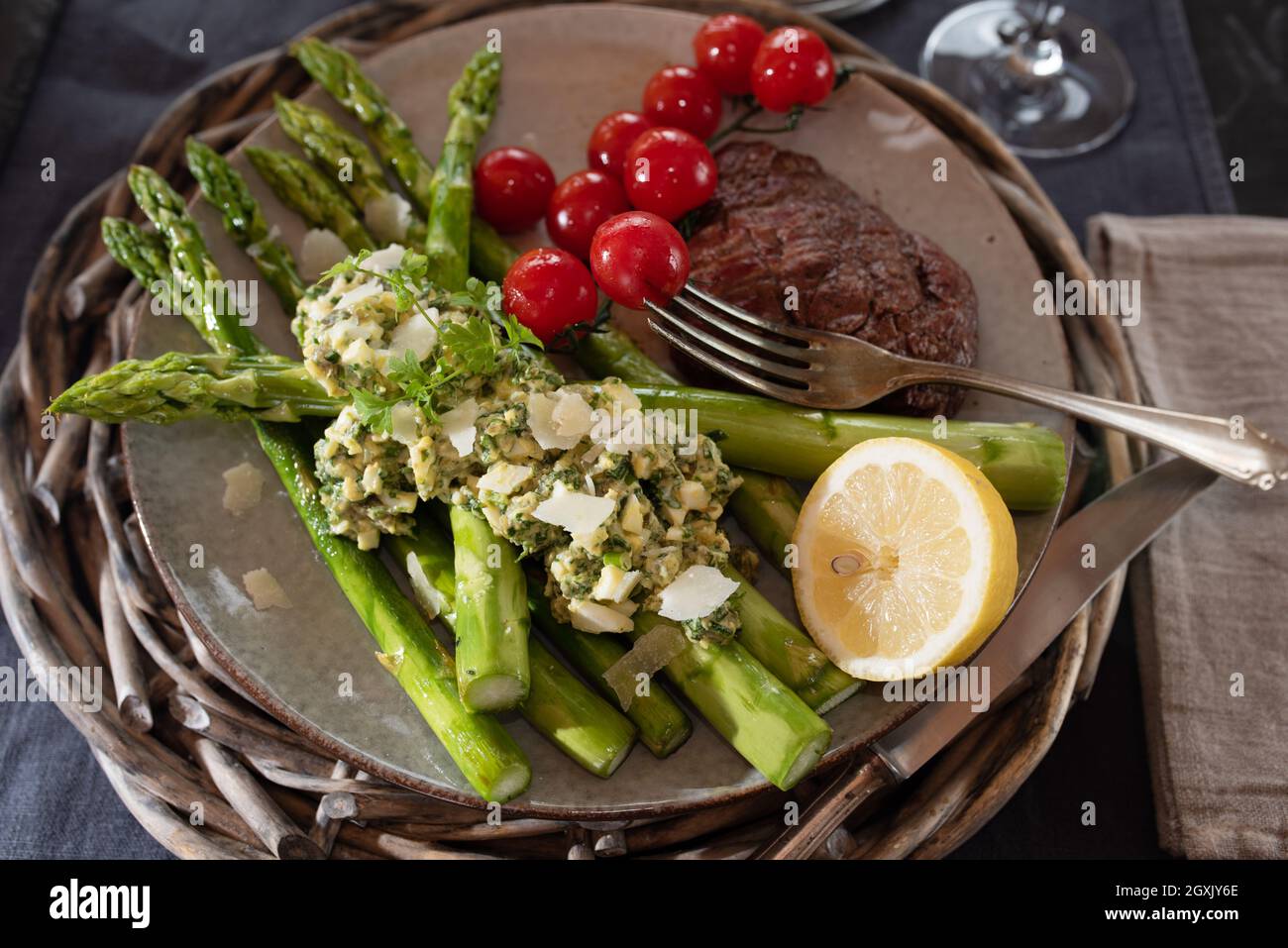 Fried green asparagus with gribiche sauce. Healthy and tasty food