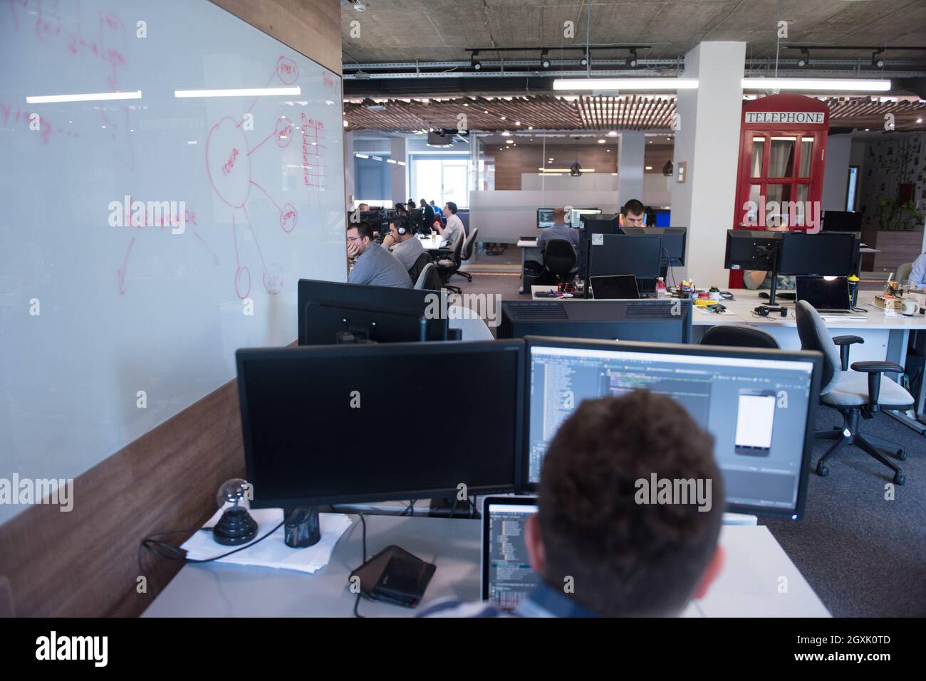 software developers writing programming code on computer Stock Photo ...