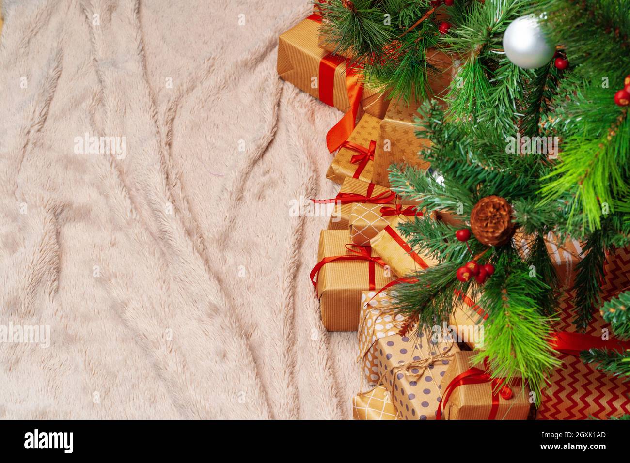 Stack of wrapped presents under Christmas tree Stock Photo Alamy