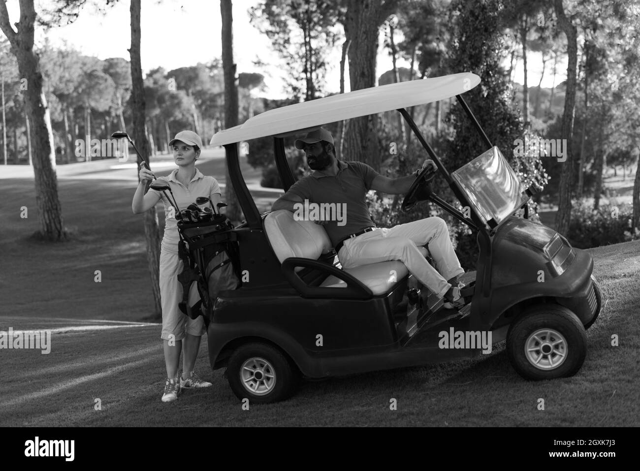 Driving golf buggy Black and White Stock Photos & Images - Alamy