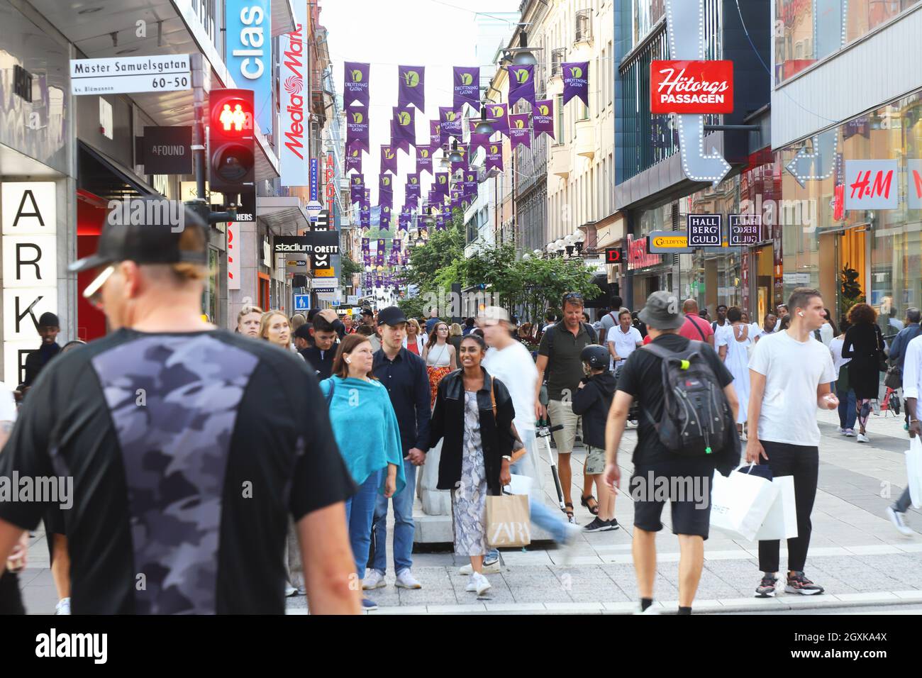 Stockholm, Sweden - July 29, 2021: View of the busy pedestrian only Drottninggatan street in downtown Stockholm. Stock Photo