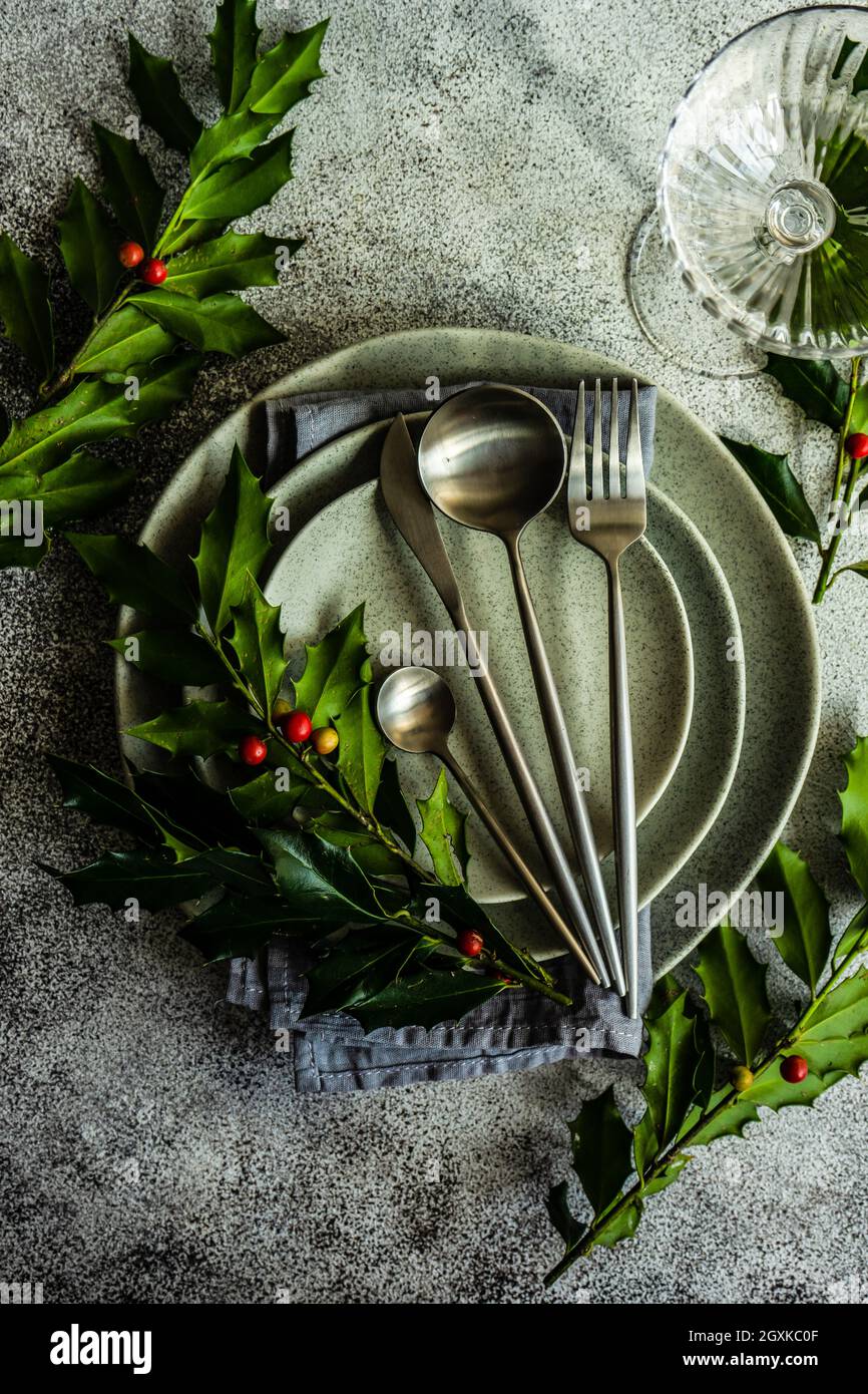 Festive table setting for Christmas dinner Stock Photo