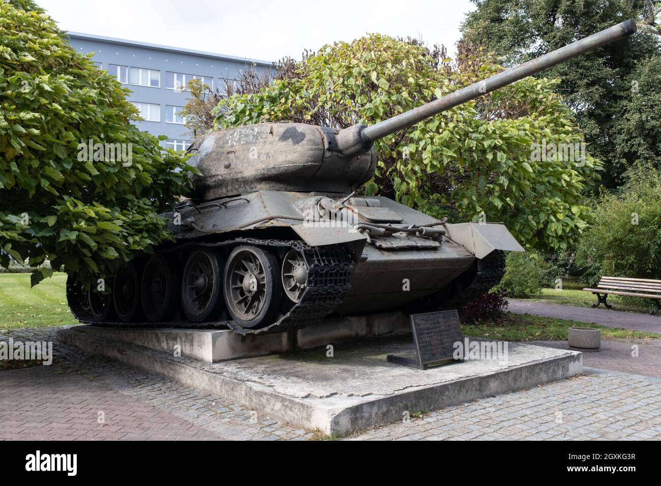 Gliwice, Poland - September 24, 2021. This Soviet T-34 85 tank was part of the Red Army force, which liberated Gliwice in 1945. Many war damages on it Stock Photo
