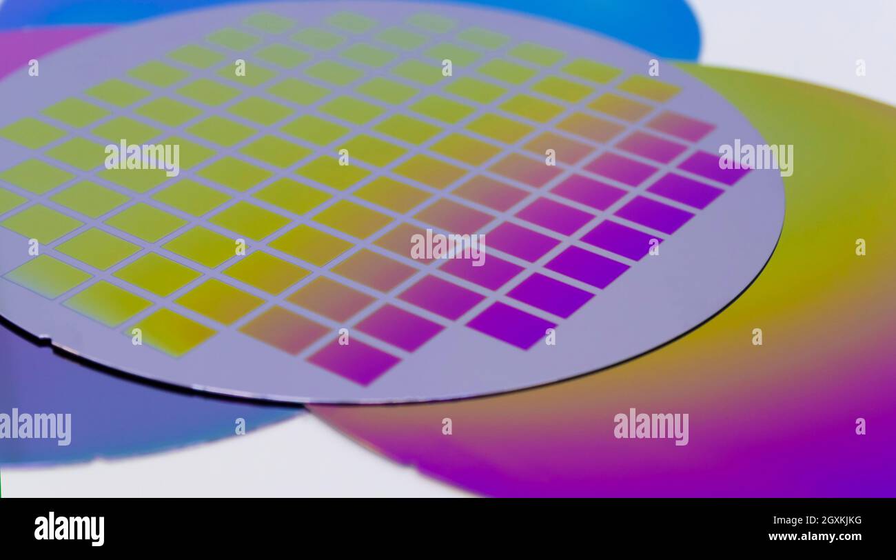 Several silicon wafers with printed circuit and different color. Banner ...
