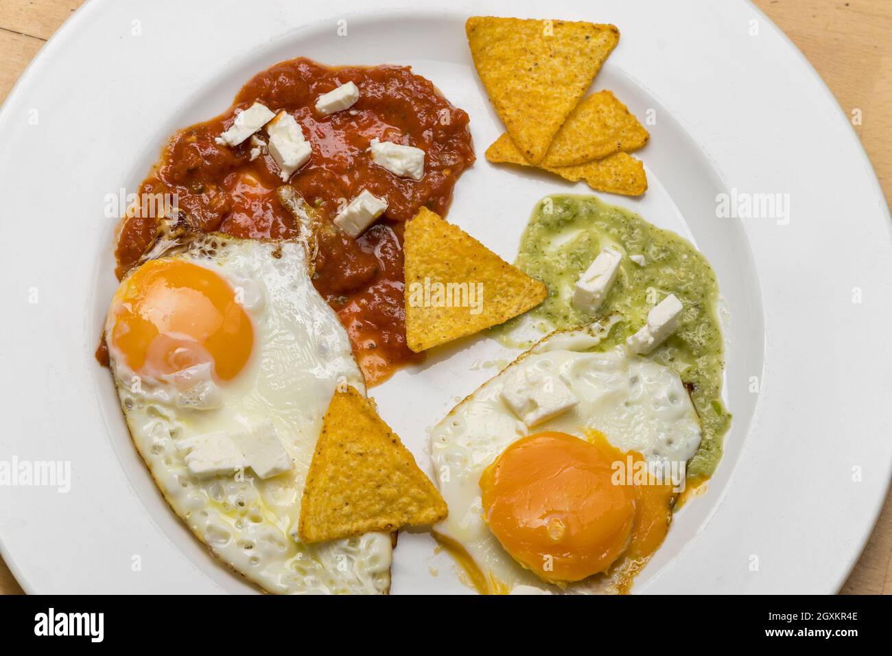 mexican fried eggs with salsa Stock Photo