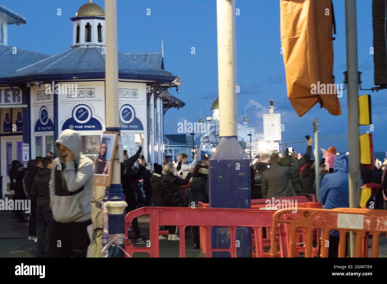 Eastbourne, UK. 5th Octoober 2021. Police were forced to act after a vigil for Sabina Nessa taking place near Eastbourne pier was disrupted by a male speaking out with regard to the nationality of  the individual arrested in Eastbourne and charged with her murder . Credit: Newspics UK South/Alamy live News Stock Photo