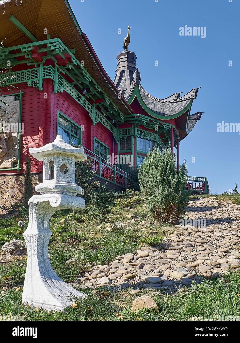 Pagoda-style modern house and garden Stock Photo