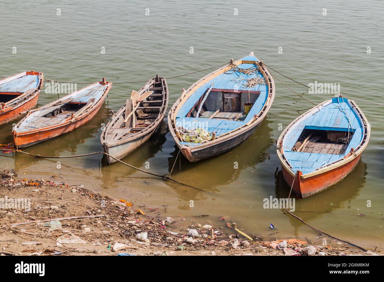 Small boats at river Ganges in Varanasi, India Stock Photo